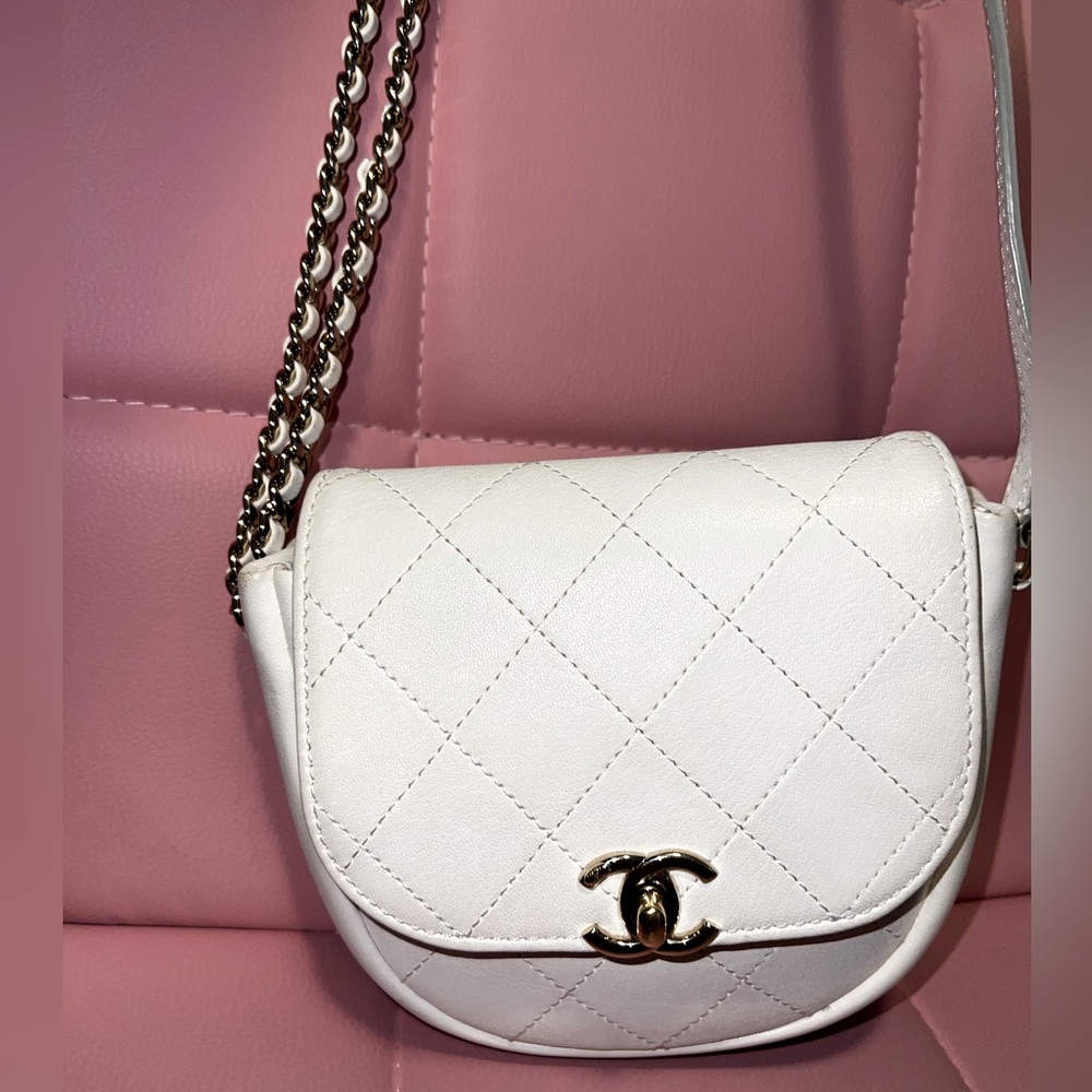 Authentic White Chanel Caviar leather mini messenger bag
